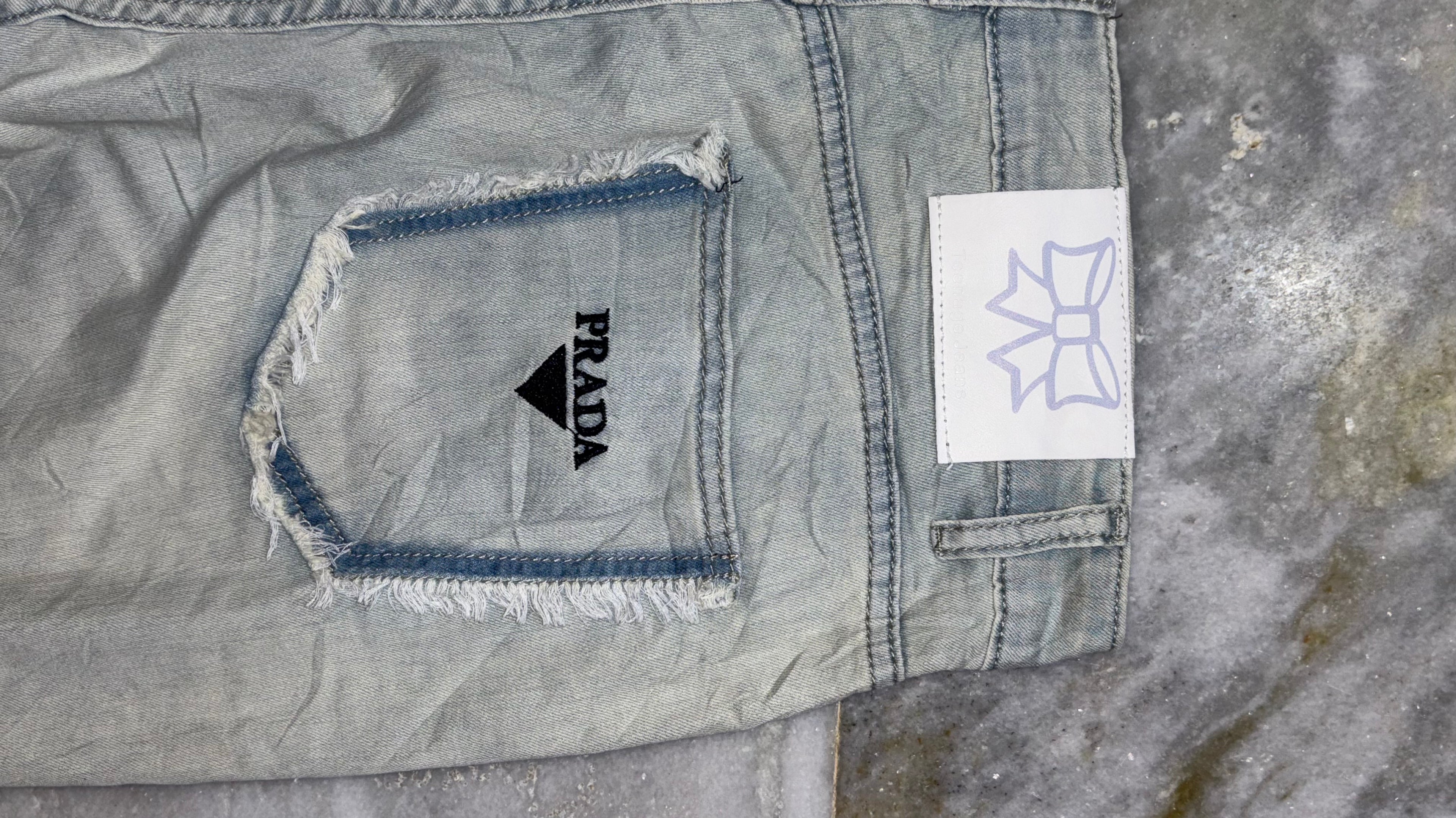 Distressed Light Wash Wide-Leg Denim Jeans