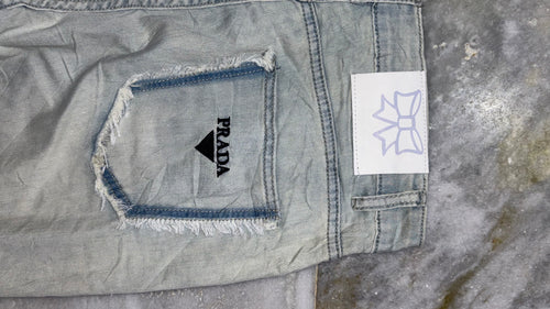 Distressed Light Wash Wide-Leg Denim Jeans