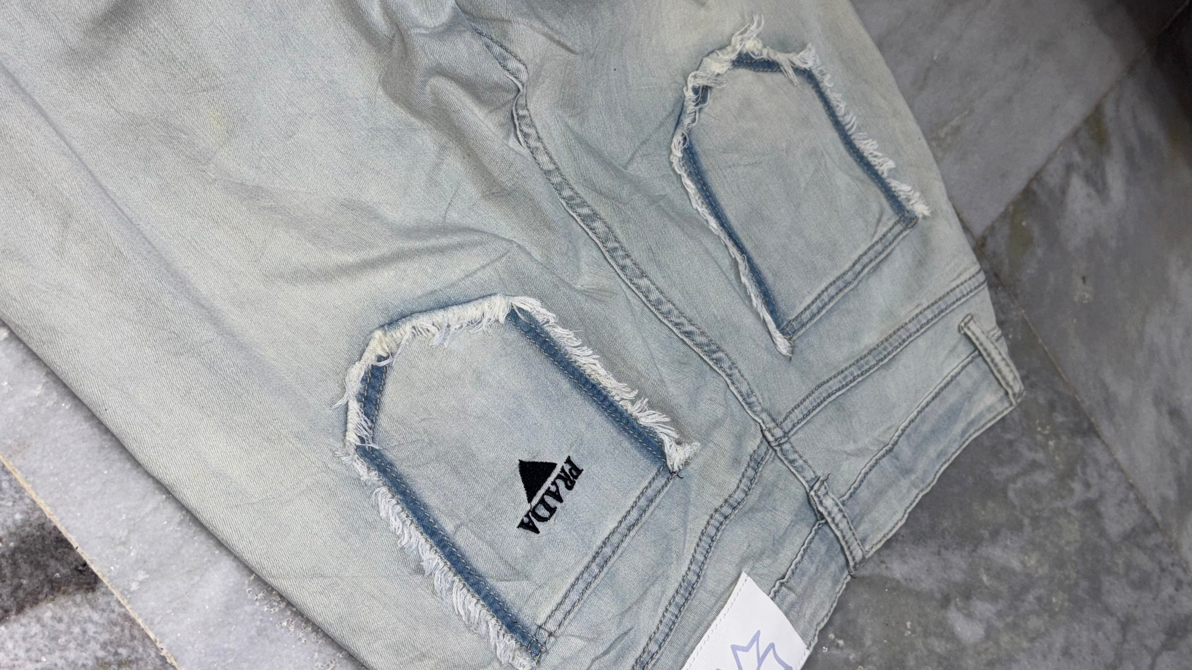 Distressed Light Wash Wide-Leg Denim Jeans