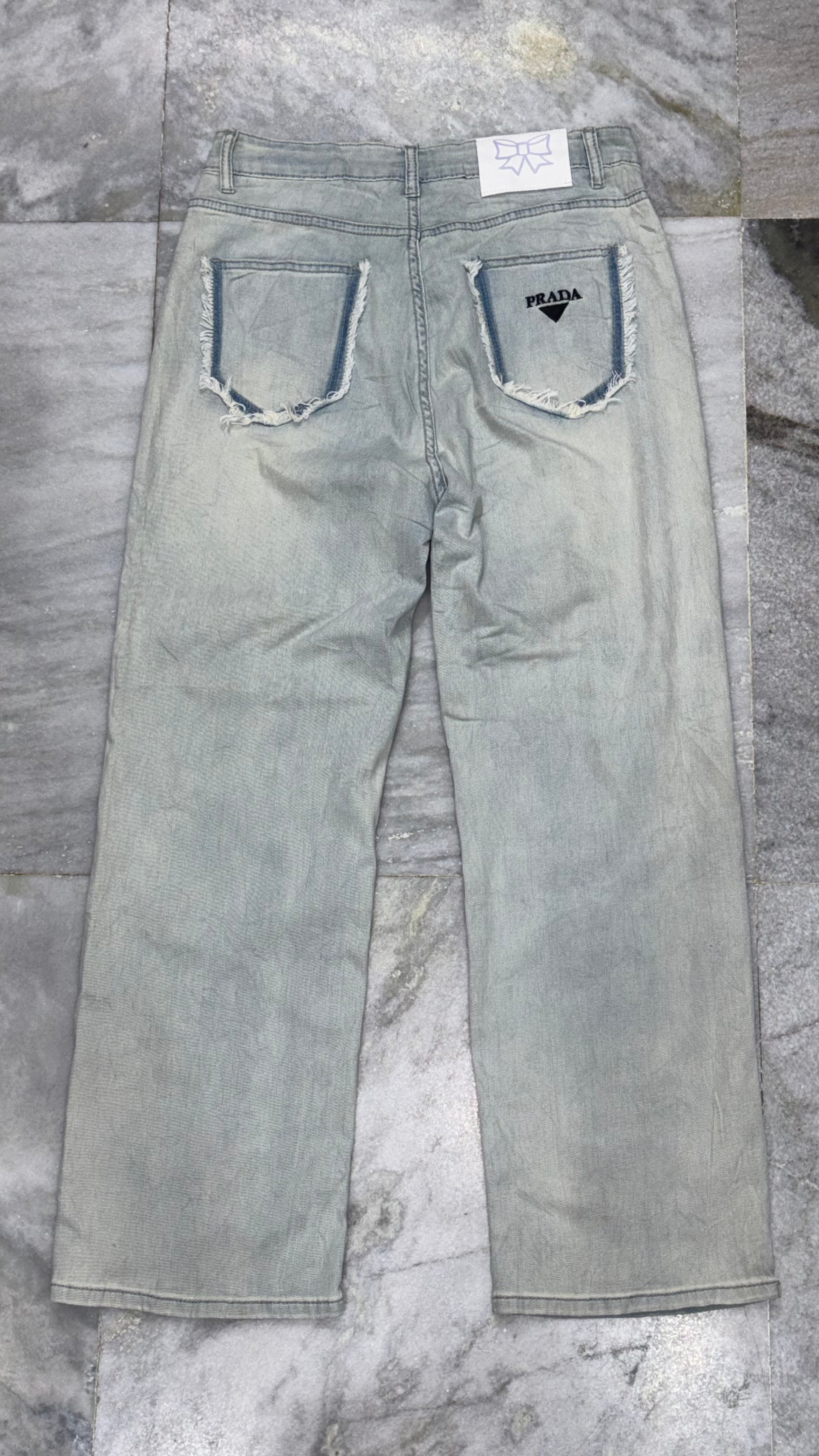 Distressed Light Wash Wide-Leg Denim Jeans