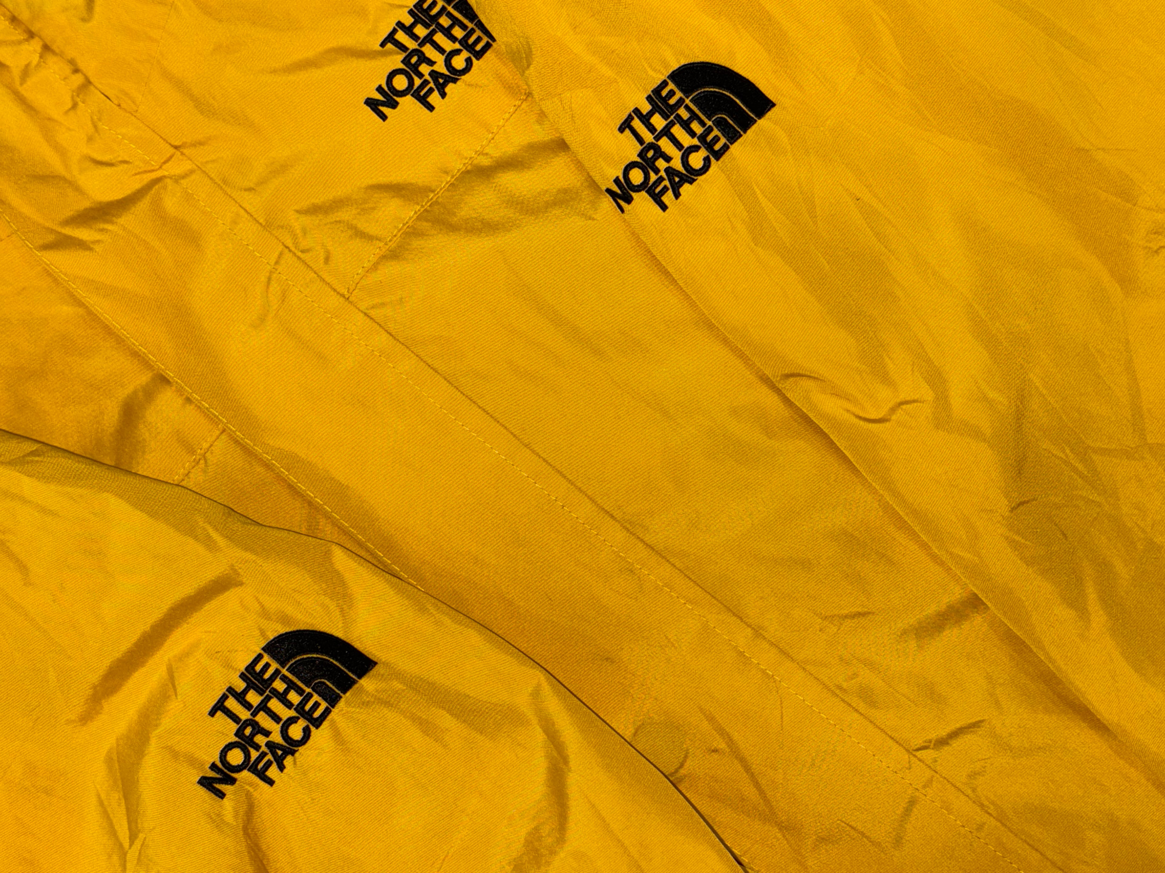 The North Face Bright Yellow Hooded Outdoor Jacket